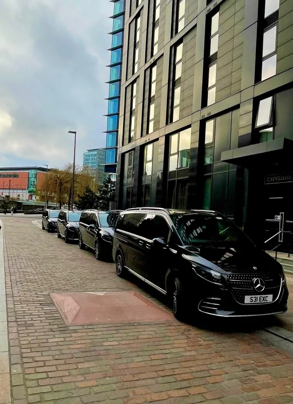 Royale Rides chauffeur fleet parked in the Manchester office district