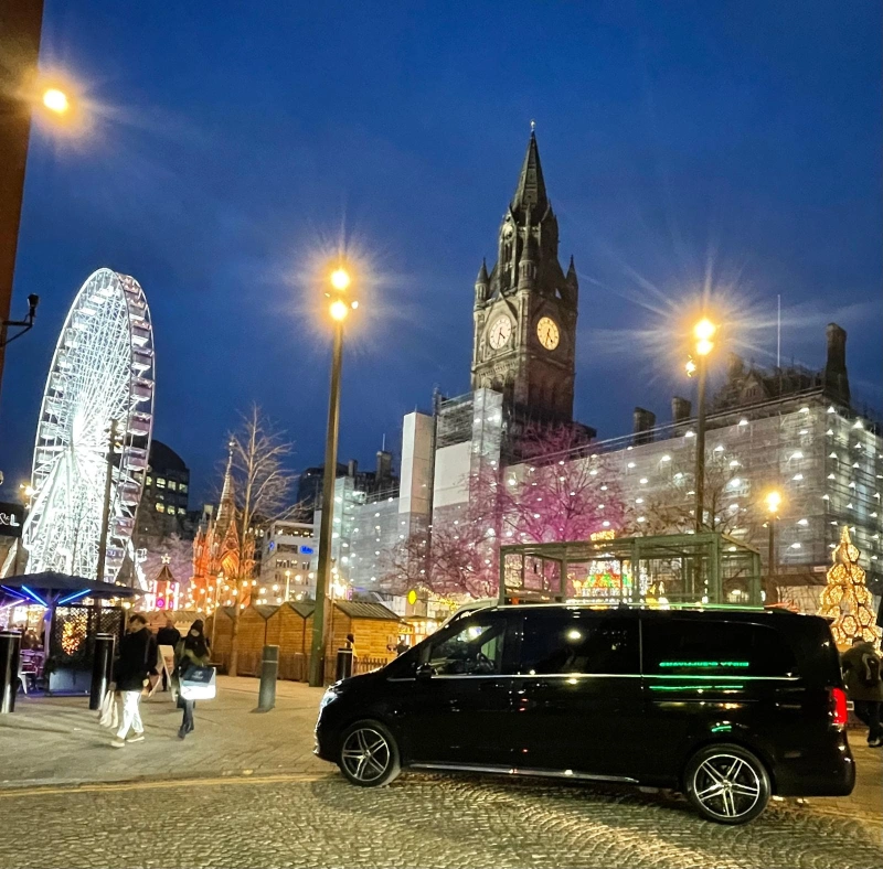 Royale Rides Mercedes V-Class on a Manchester city centre street at night