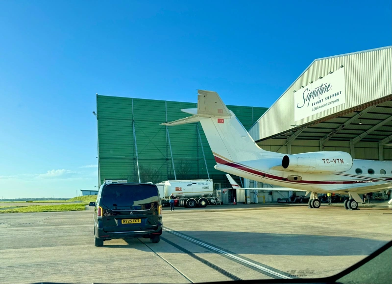 Mercedes V Class inside the Signature Aviation hangar for an FBO chauffeur collection