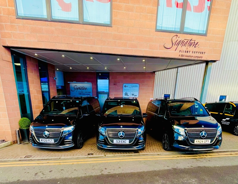 Royale Rides chauffeur vehicles waiting airside for a long distance UK airport transfer