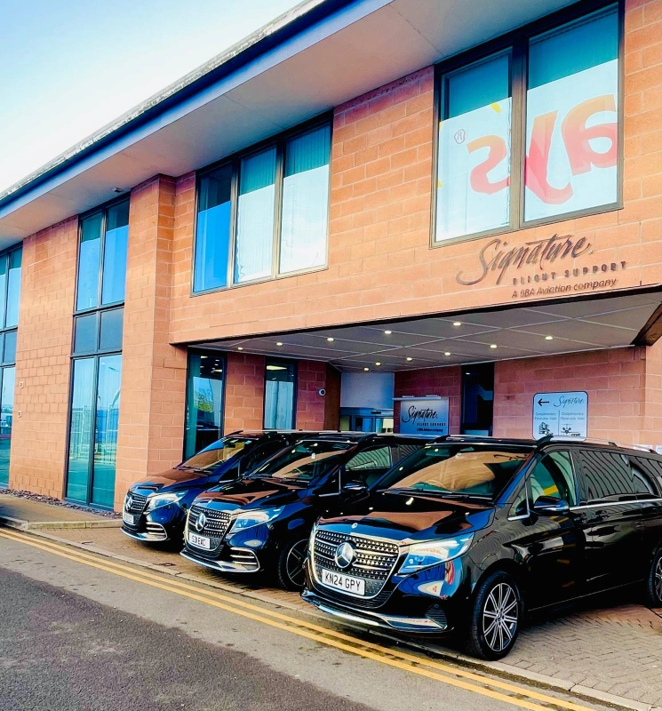 Royale Rides executive fleet lined up before a Manchester stadium fixture